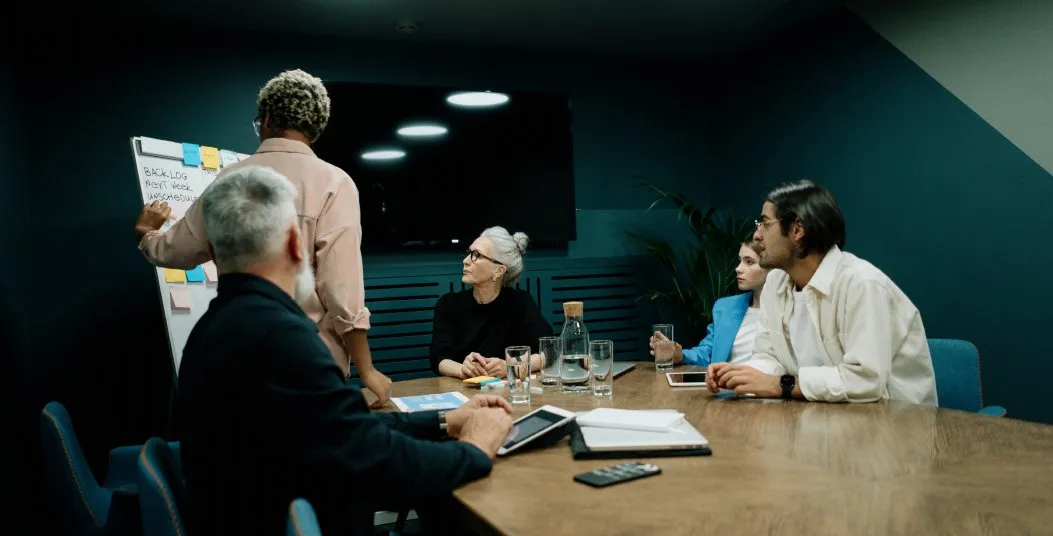 Team discussion around a meeting table